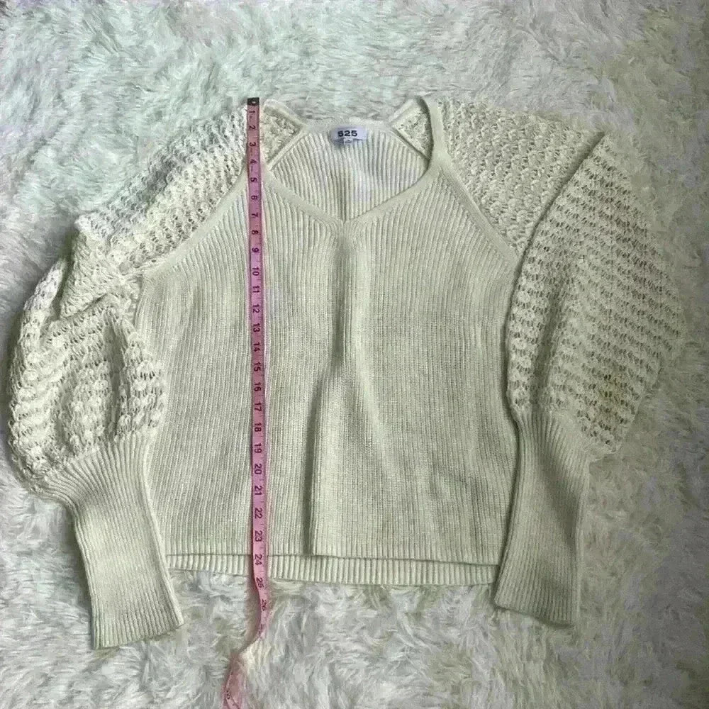 525 Women’s cream color sweater with crocheted poet sleeves. Size XL.